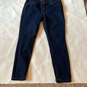 woman’s short dark denim jeans